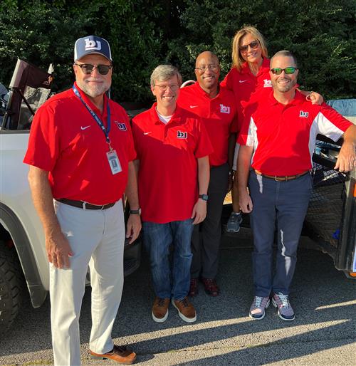 Superintendent Dr. Nichols with board members before parade